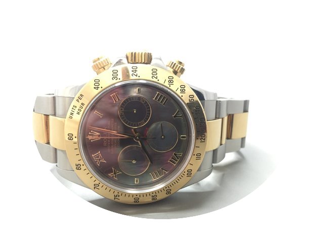 Rolex daytona steel gold...