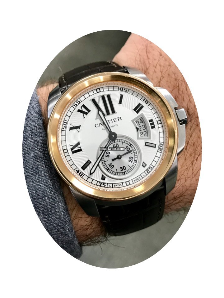 Cartier Calibre acier lunette or rose Re...