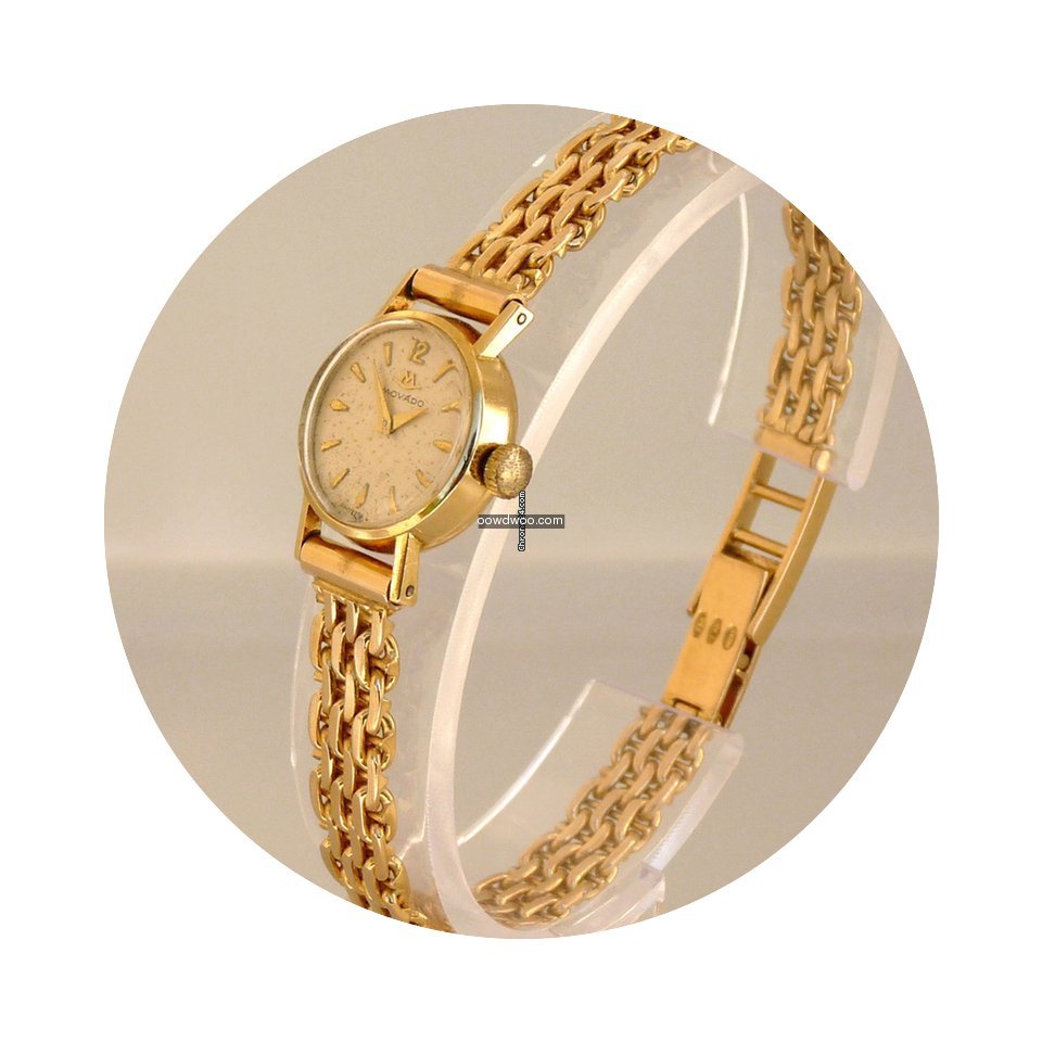 Movado Ladies 18K Gold Watch...