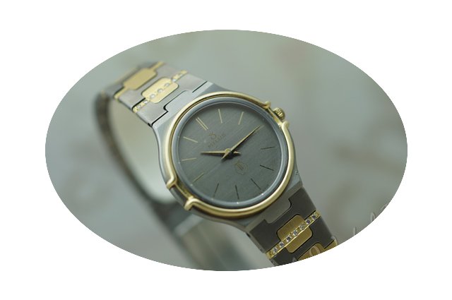 Milus vintage ladies titanium/gold diamo...