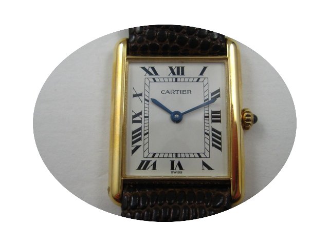 Cartier - 18k GOLD TANK, QUARTZ MOVEMENT...