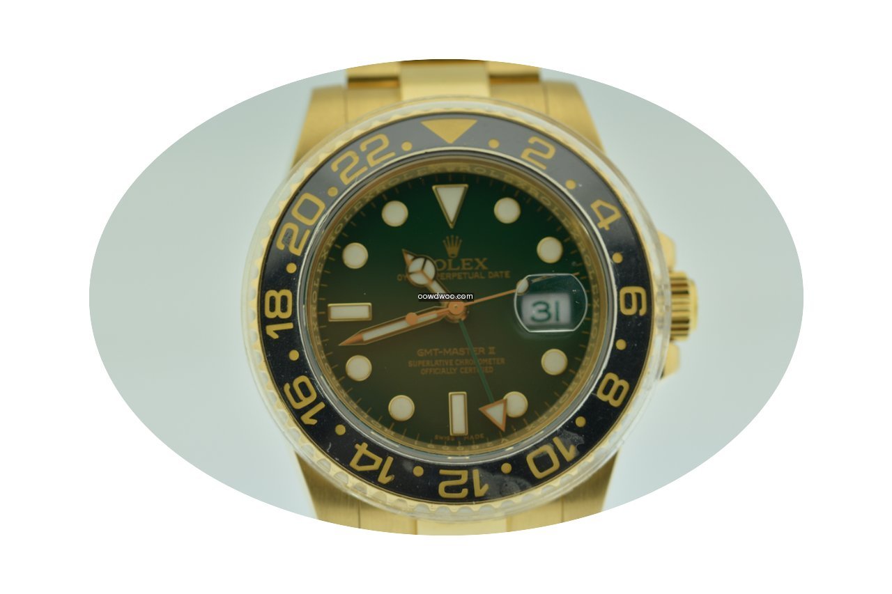 Rolex GMT MASTER II YELLOW GOLD GREEN...