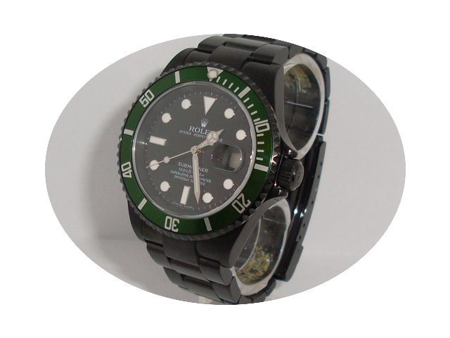 Rolex Submariner Jubiläum Grüne Lünet...