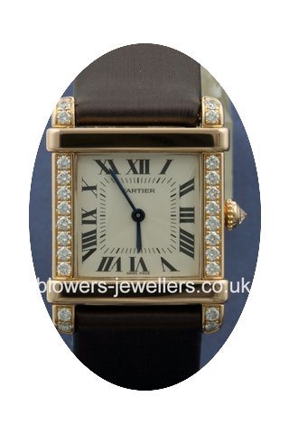 Cartier Tank Chinos...