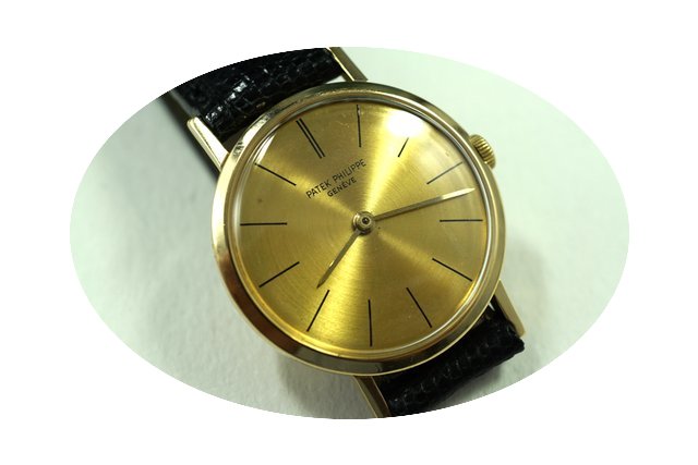 Patek Philippe 18k yellow gold dress wat...