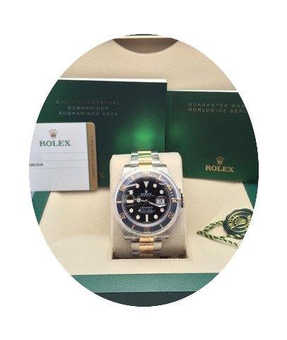 Rolex Submariner BLACK YG/SS Watches...