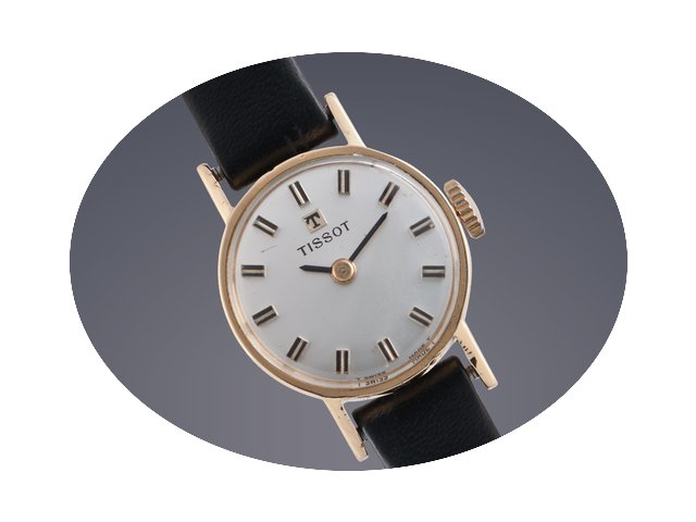 Tissot 18ct gold manual...