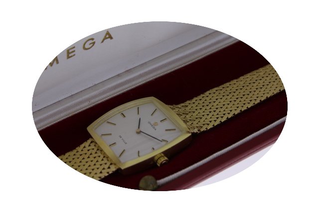 Omega Complet or 18ct 55.6gr...