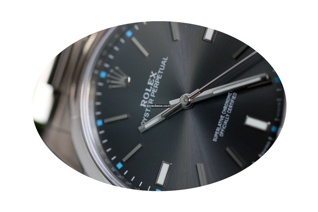 Rolex Oyster Perpetual 39 114300 Dark Rh...