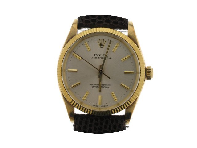 Rolex Oyster Perpetual Yellow Gold...