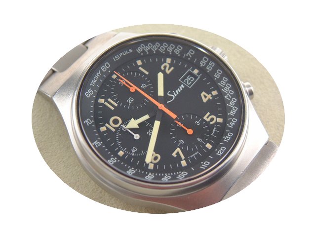 Sinn 144 GMT Stahl mit Stahlband, Box un...