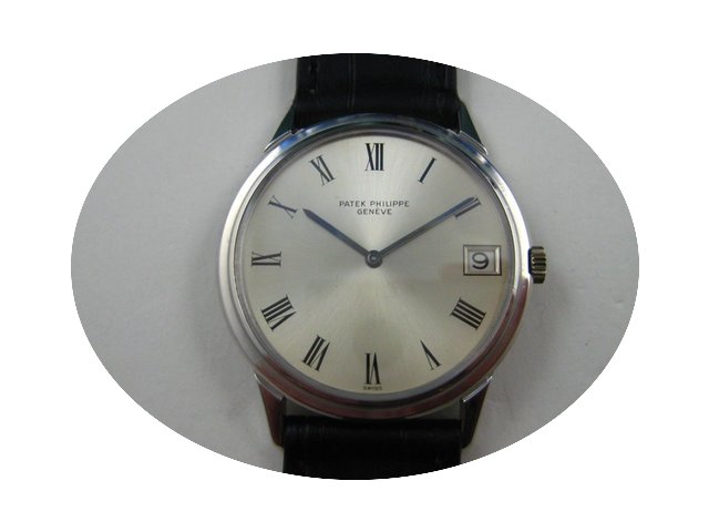 Patek Philippe 18K automatic date with e...