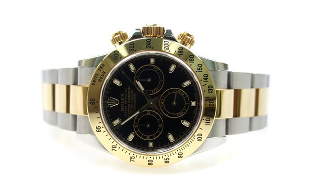Rolex Daytona 18K Gold...