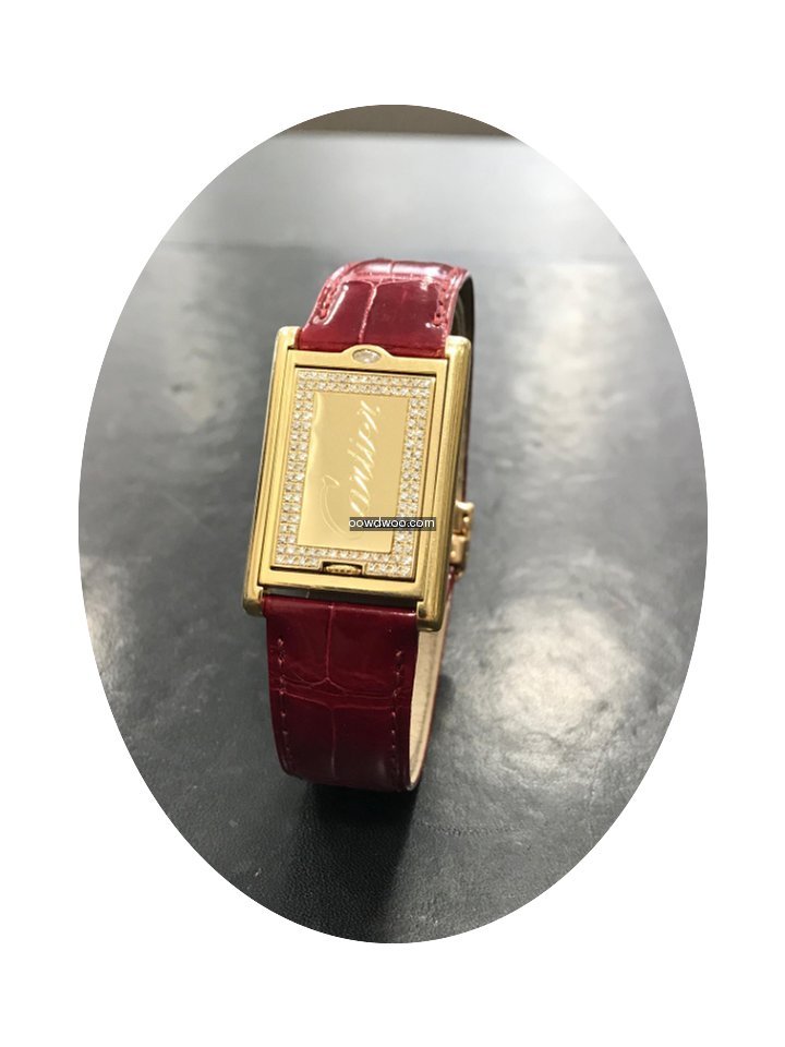 Cartier Tank basculante or jaune 18k et ...