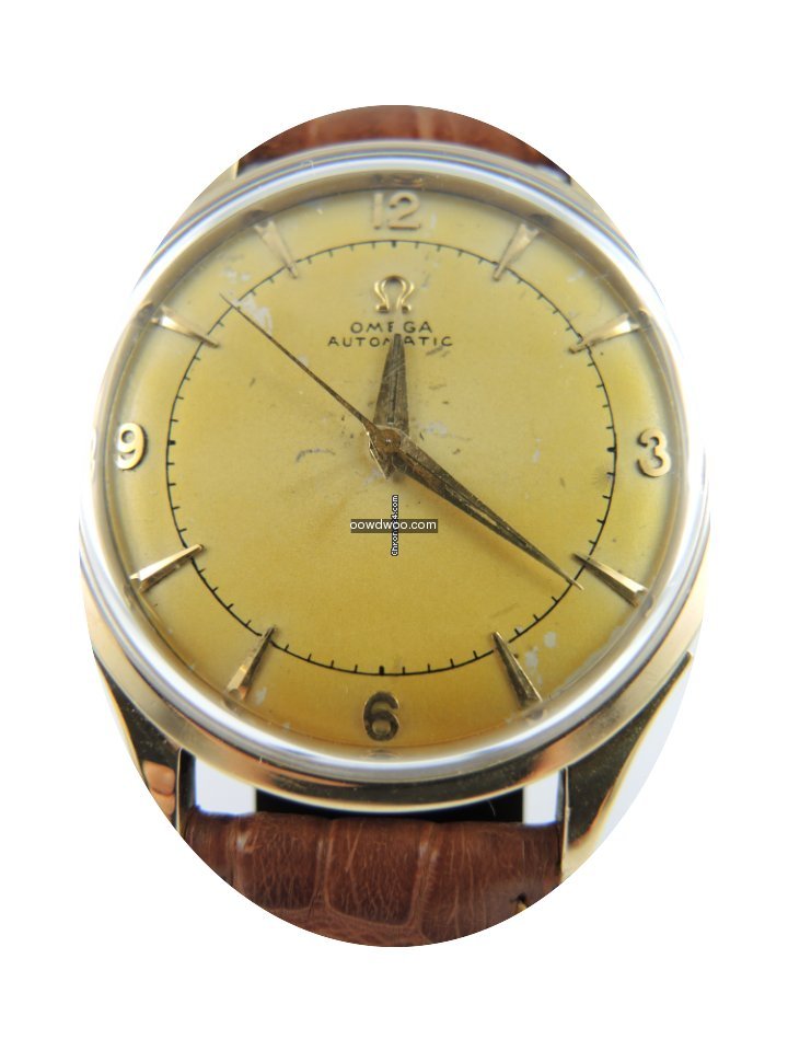 Omega Automatique, en or jaune 14 KT...