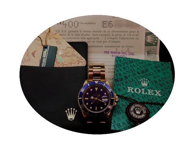 Rolex 16618 Submariner 18k YG with brace...