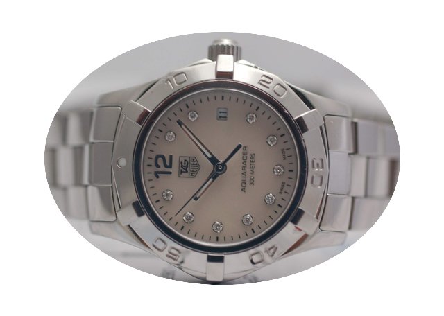 TAG Heuer Ladies. aqua racer diamonds...