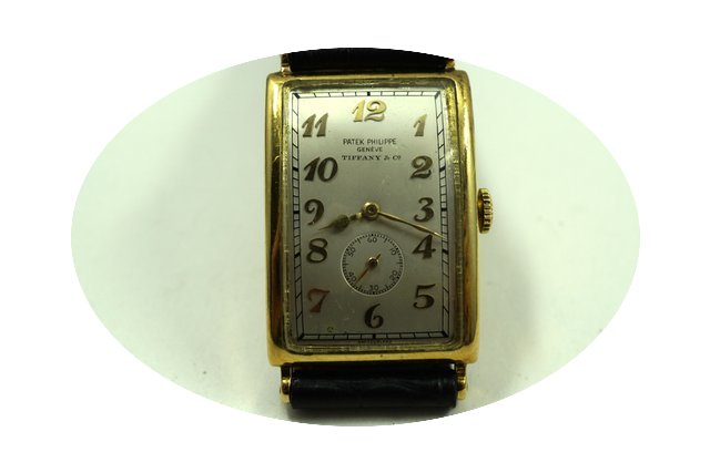 Patek Philippe early rectangle 18k dates...