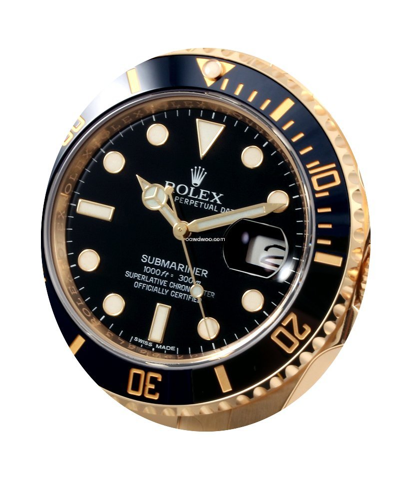 Rolex 18K Yellow Gold Ceramic Submariner...