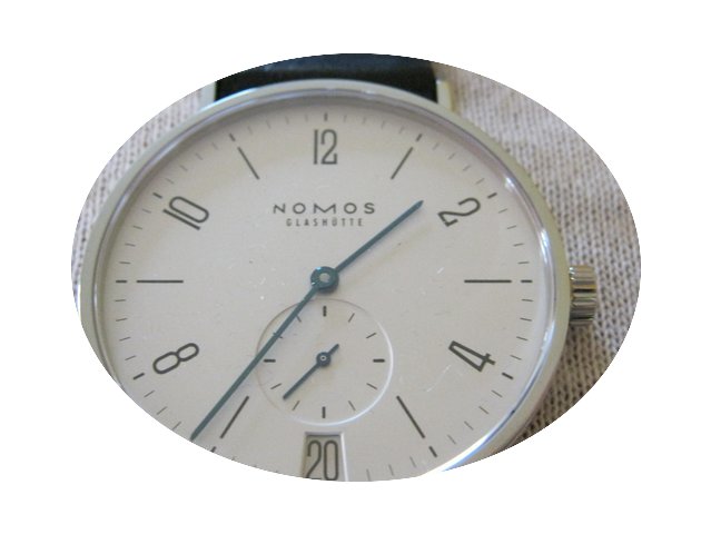 Nomos Tangomat mit Datum...