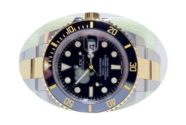 Rolex Submariner 18K Gold...