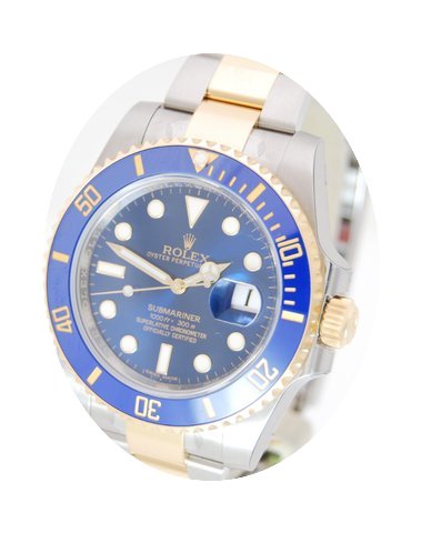 Rolex Submariner Stahl/Gold Box & Pa...