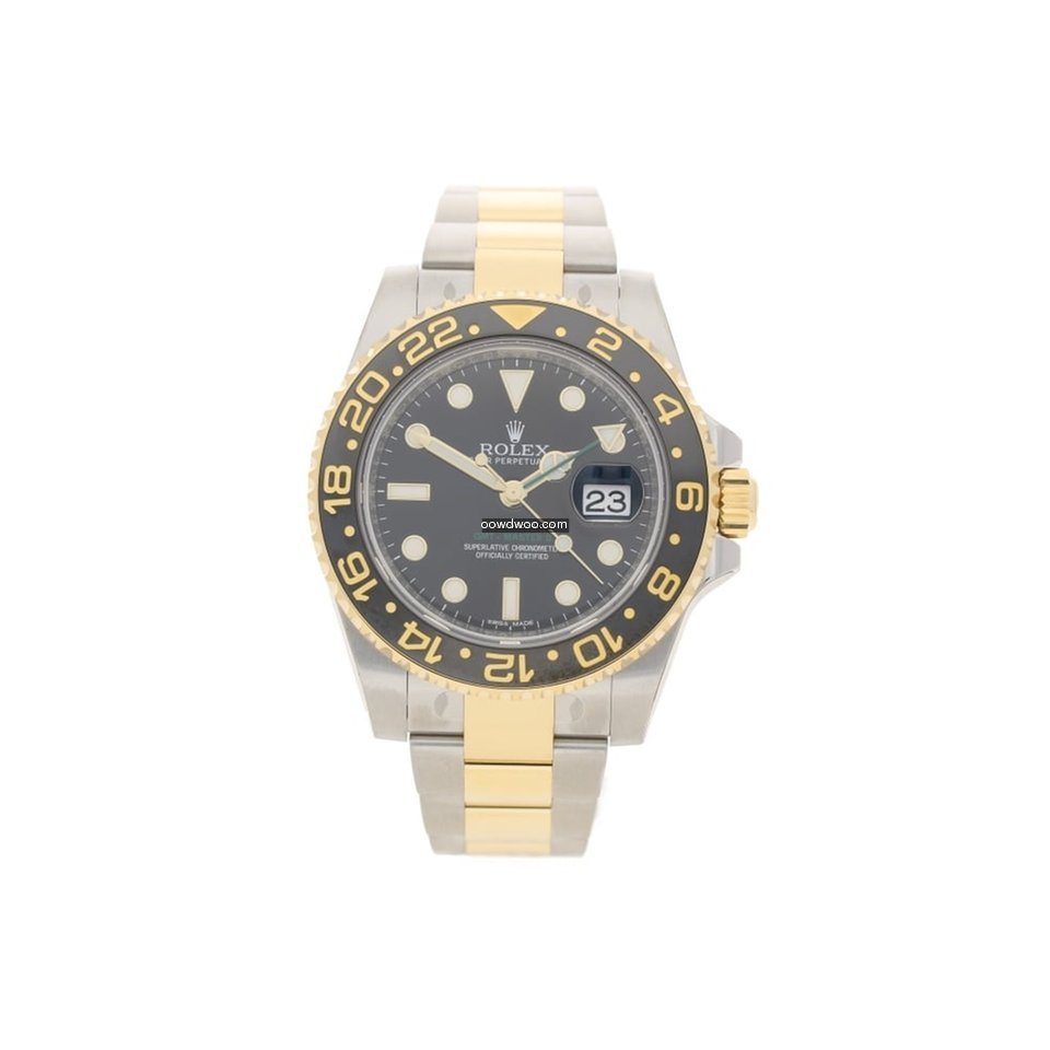 Rolex GMT Master II 116713LN - Steel & G...